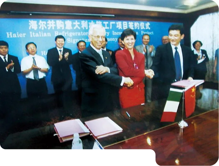 Signing ceremony, Haier purchased a Meneghetti's refrigerator factory in Italy.